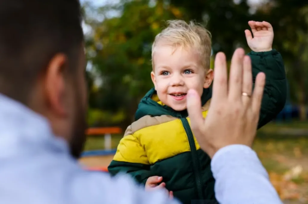 What role does positive reinforcement play in raising responsible children?